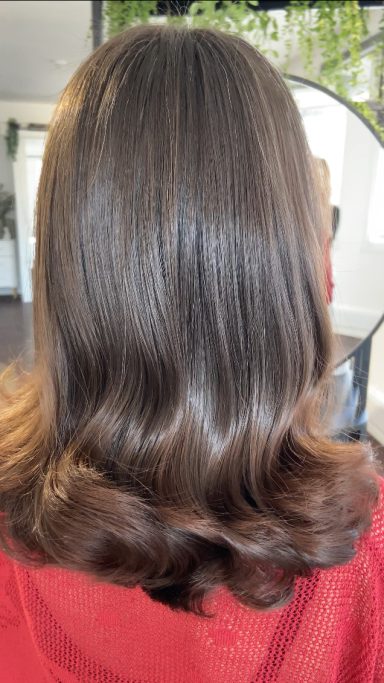 Shoulder length hair cut, with curly blowdry, very shiny